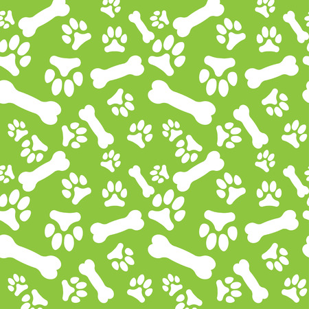 Seamless pattern with white dog paw prints and bones on a green background. Vector illustrationのイラスト素材