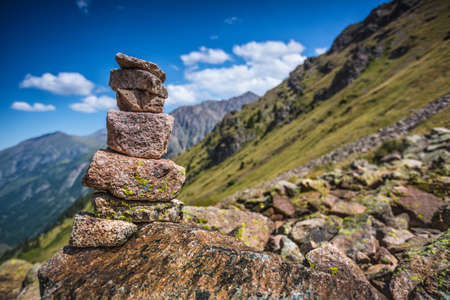 Stone cairn   pyramid  in mountainの写真素材