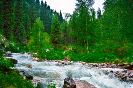 landscape river mountain cloudy skyの写真素材
