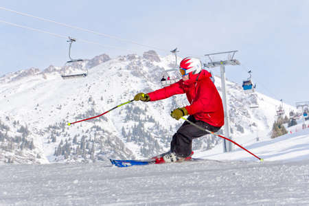 athletes skiing in the mountainsの写真素材