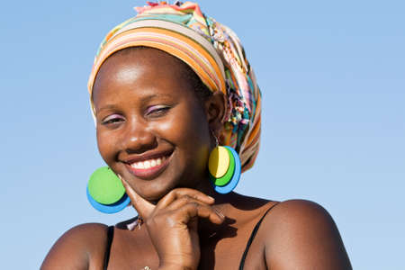 Confident attractive African woman listening carefully の写真素材