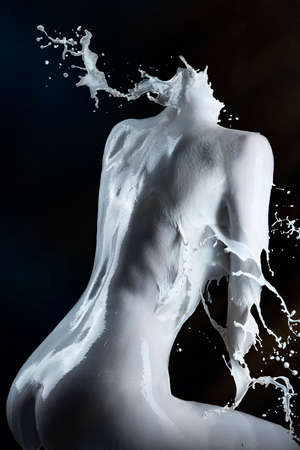 milk dress on a female body from a back.の写真素材