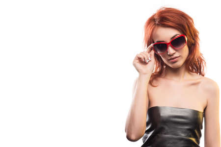 the redhead girl in sunglasses type 4.の写真素材