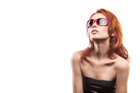 the redhead girl in sunglasses type 14.の写真素材