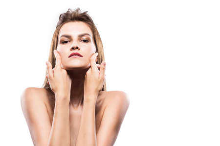 Potrtrait of young adult woman with clean fresh skin - isolated on white
