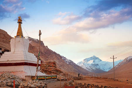 View of Mount Everest from the RongPu Monastery, at the Everest Base Camp in Tibet, against a...