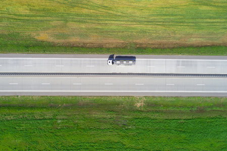 Truck on highway from above. Transportation background.の写真素材