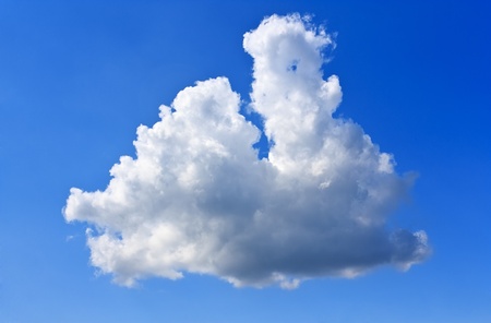 Beautiful cloud of unusual shape and the blue skyの写真素材