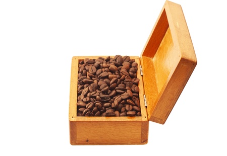 Coffee beans in a wooden box isolated on a white backgroundの写真素材