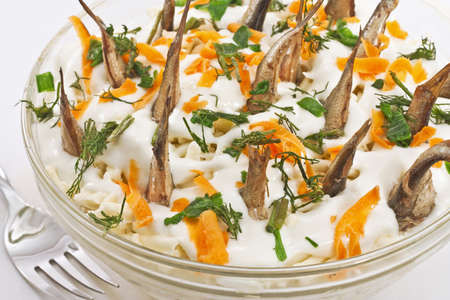 Salad Fish in the pond on a plate closeup
