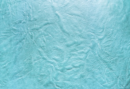 Decorative artificial turquoise leather texture with folds horizontalの写真素材