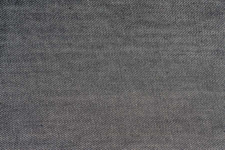 Texture of gray jeans fabric close-upの写真素材