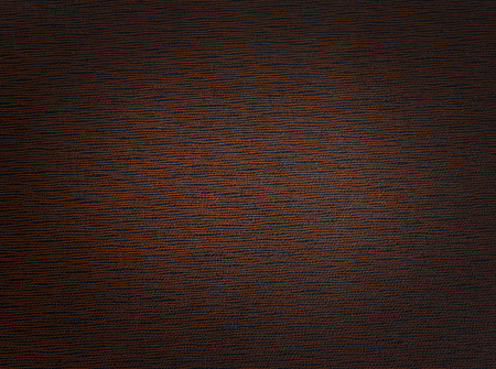 Texture of the old dark brown paper with vignette closeupの写真素材