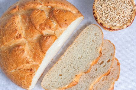 Sliced white bread and grains of wheat. Top viewの写真素材