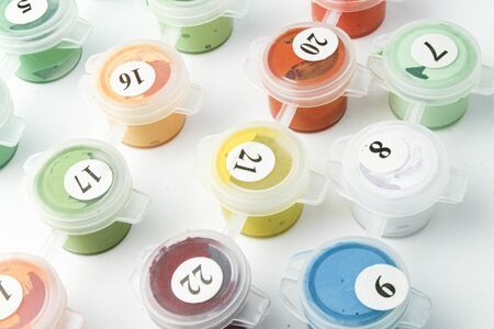 Painting by numbers. Coloring by a plot with numbers in the corresponding color.の写真素材