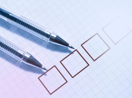 The marker in the graph is healthy with a pen in a notebook.の写真素材