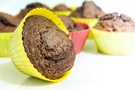 Baked muffins on a white table.Close -up