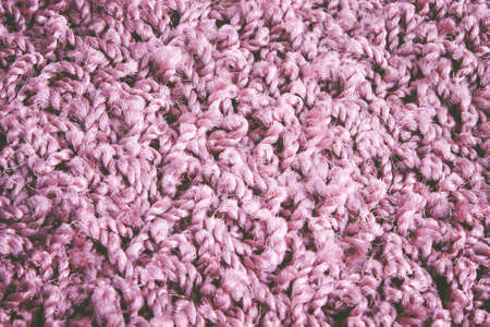 Carpet fibers close up. purple carpet texture, top view.の写真素材