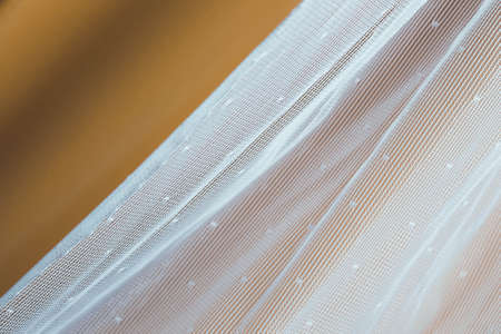 White artistic embroidery in lace style. Close-up.の写真素材