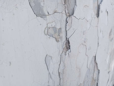 Broken wall texture with old cracks. Ruins of an ancient castle.
