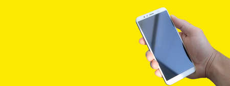 Phone in hand with black display. Phone repair banner. Holds a phone in his hand.