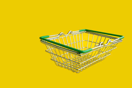 The grocery basket is empty. Metal basket for purchases in the store. Stacking products.の写真素材