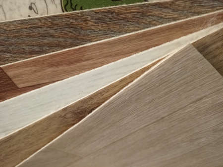 The choice of linoleum. Examples and types of flooring. Household linoleum for the home. A bunch of samples for example in the store. Floor coverings design.の写真素材
