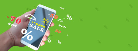 Phone in hand with inscription Sale. Summer sale. Discounts on the phone. In-app purchases.の写真素材