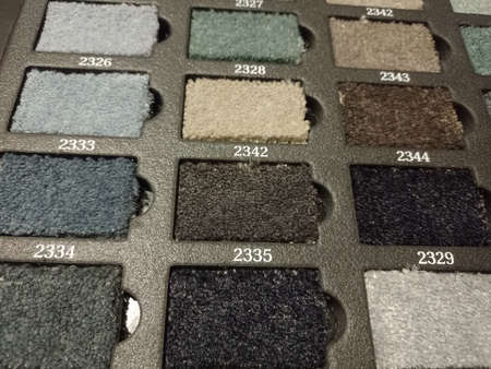 Sliced pieces of carpet. Samples of flooring. Home carpet.