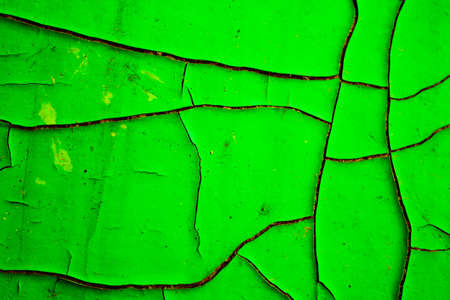 Cracks texture. Deep cracks close up. Old paint is dry and cracked.