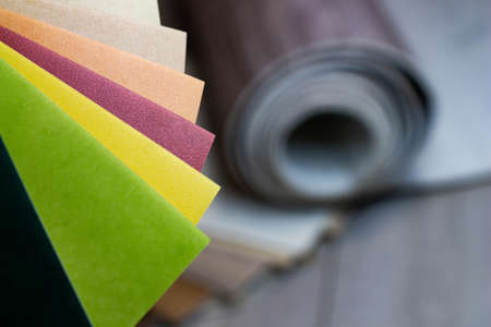 A piece of linoleum for samples. Sliced wood grain linoleum.の写真素材