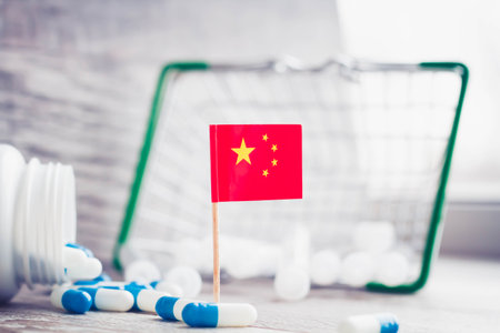 Medicines in china. Country flag and pills close up.の写真素材