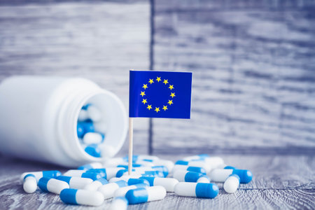 Medicines in the European Union. Country flag and pills close up.の写真素材