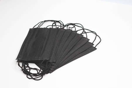 Black mask. face mask against the virus. Black medical bandage for operations. virus protection.