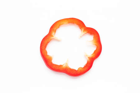 Pepper. Sliced red pepper. vegetable rings. Fresh vegetable close-up. Bulgarian pepper on a white background.の写真素材