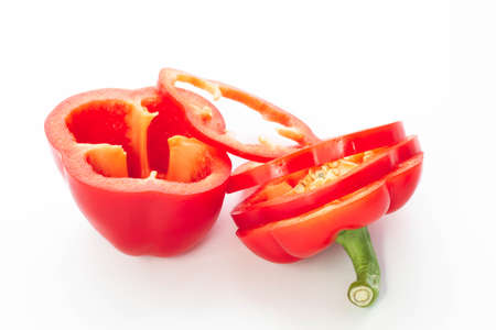 Pepper. Sliced red pepper. vegetable rings. Fresh vegetable close-up. Bulgarian pepper on a white background.の写真素材