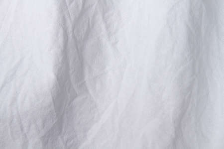 Texture of white fabric. White background close up. Factory fabric in white. White fabric background.の写真素材