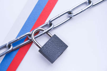 Flag of Russia and a chain with a lock. country blocking. Prohibited. The imposition of sanctions. closed area.の写真素材