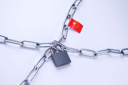 Flag of China. Import and export ban. closed borders. Arrest of property. The state has restricted access. Restriction of movement.の写真素材