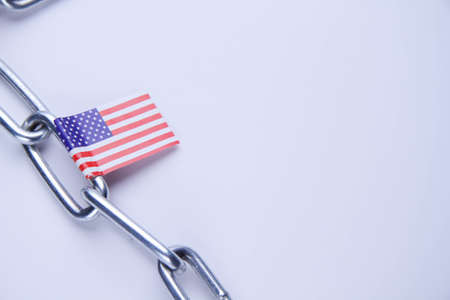 american flag. Import and export ban. closed borders. Arrest of property. The state has restricted access. Restriction of movement.の写真素材