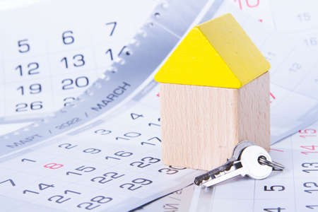 Buying a house Planning for the purchase of real estate. Saving money to buy a home. Apartment keys and money close-up.の写真素材