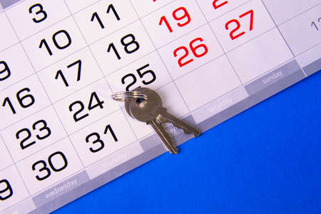 Keys and calendar. Purchase planning. The date the vehicle was purchased. The transaction took place on a certain date.の写真素材