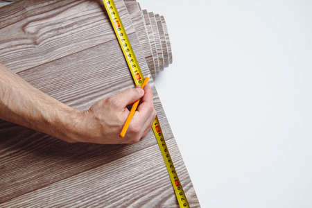 Waterproofness of linoleum. Waterproof linoleum in the kitchen. Sample roll.の写真素材