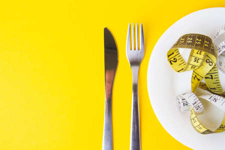 certain diet. obesity problems. Healthy food concept. Fitness workout and diet for weight loss.の写真素材