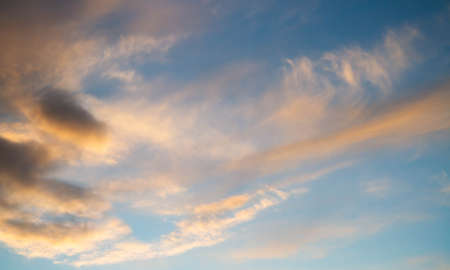 summer sky. Cumulus clouds on a blue background. partly cloudy. Dark clouds and white clouds.