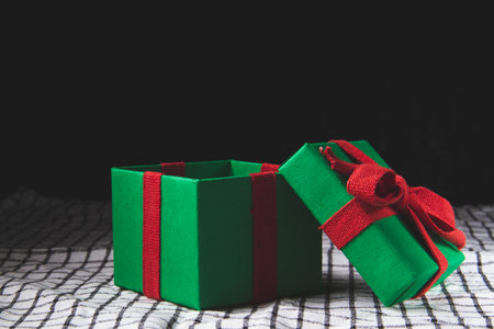 Waiting for the new year. Box with a New Year's gift. christmas pictures. Open box with a gift.の写真素材