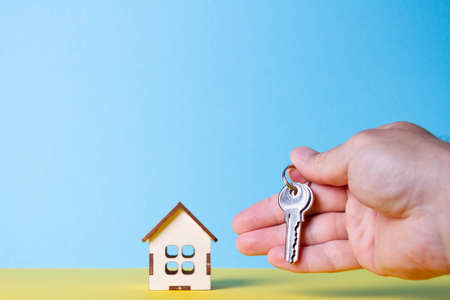 Buying a house The buyer receives the key to the property. Mortgage apartment. Keys and a small...