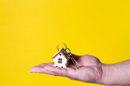 Buying a house The buyer receives the key to the property. Mortgage apartment. Keys and a small...