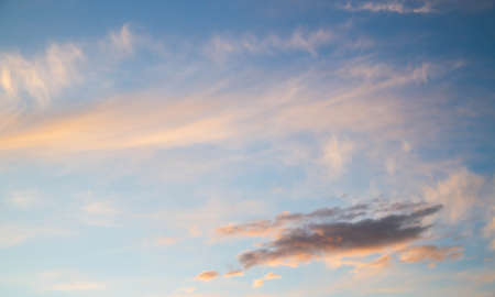 Summer sky. Cumulus clouds on a blue background. Partly cloudy. Dark clouds and white clouds.の写真素材