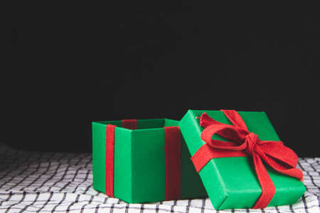 Waiting for the new year. Box with a New Year's gift. Christmas pictures. Open box with a gift.の写真素材